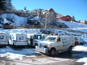 Tom making sure the Postal vehicles are ready to roll